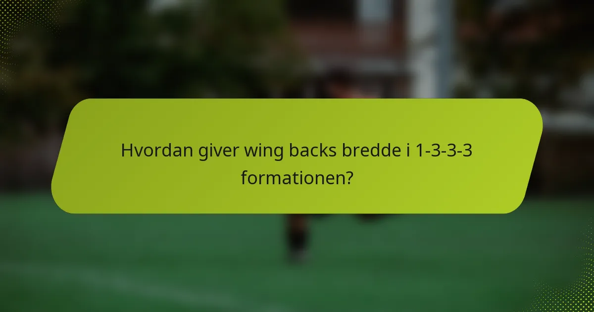 Hvordan giver wing backs bredde i 1-3-3-3 formationen?